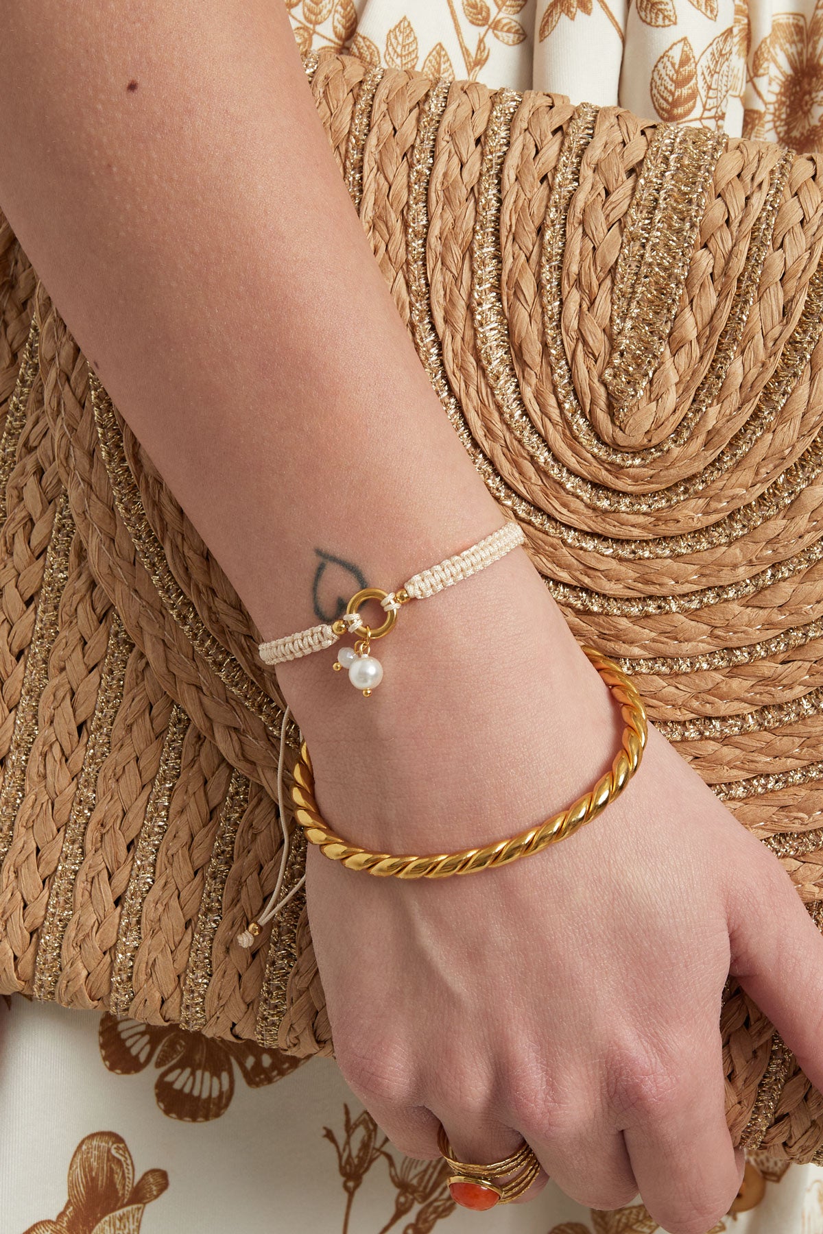 Gevlochten armband met parel